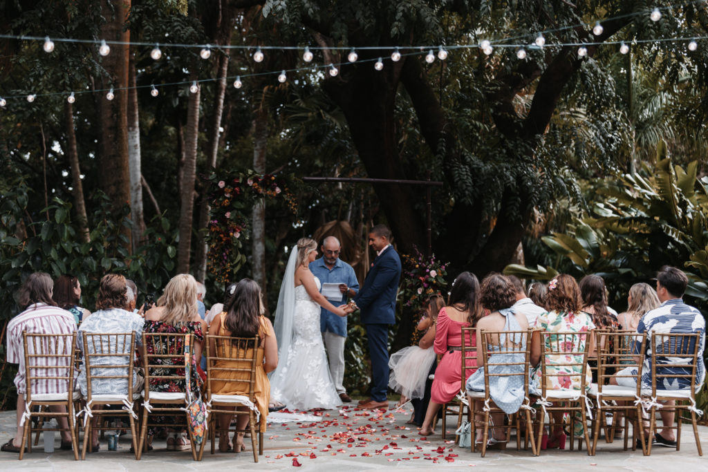 wedding ceremony at queen emmas summer palace with string lights
